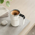 Taza termica con mezclador automatico